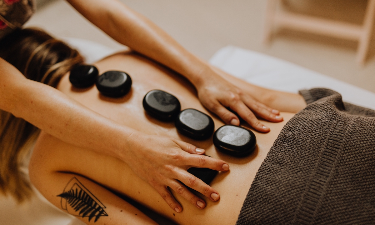 Hot stone massage therapy session